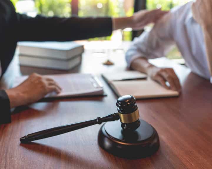 professional lawyer discussing legal options and solutions with a client in Sacramento